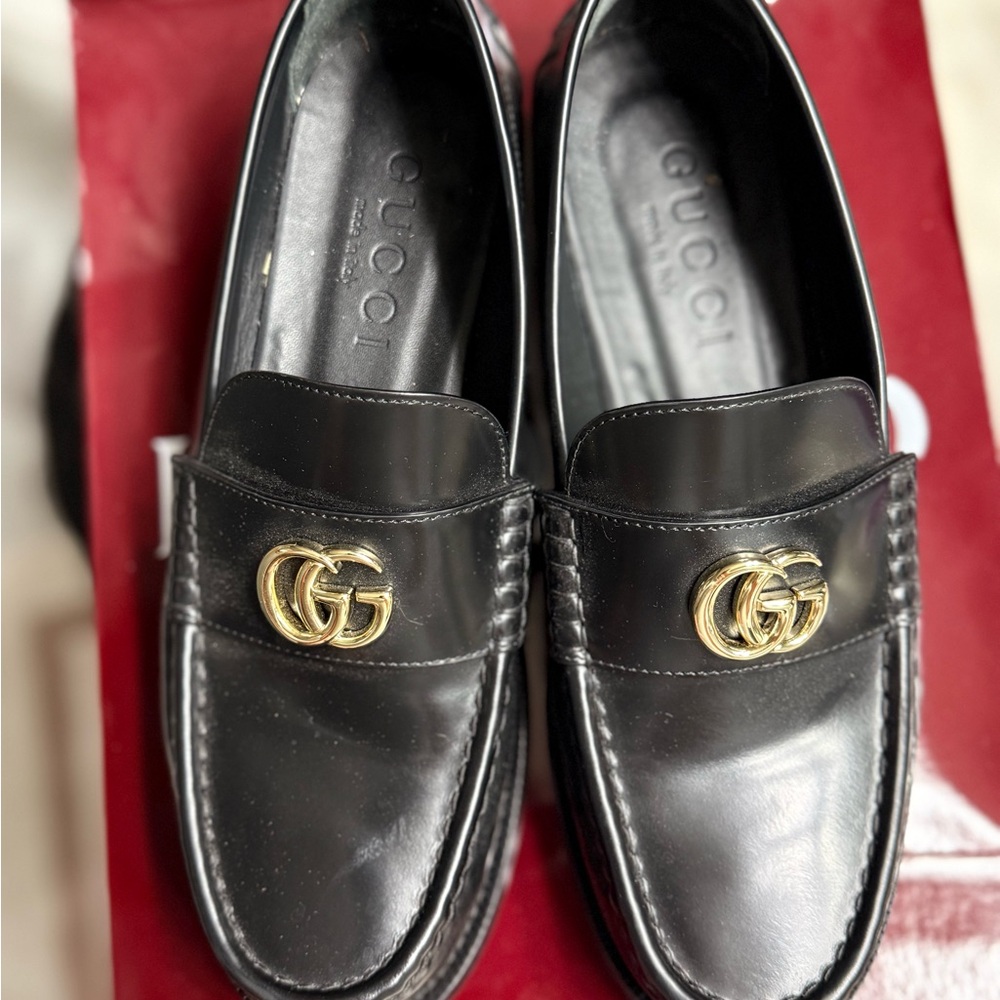 Gucci Black Loafers with Gold Emblem